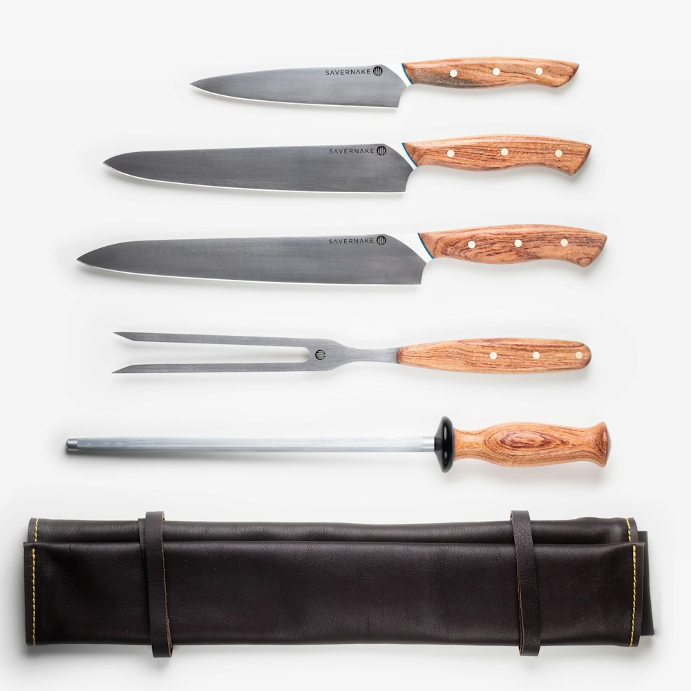 photo-1593618998160-e34014e67546 Stainless Steel Kitchen Knife Set - Image 1